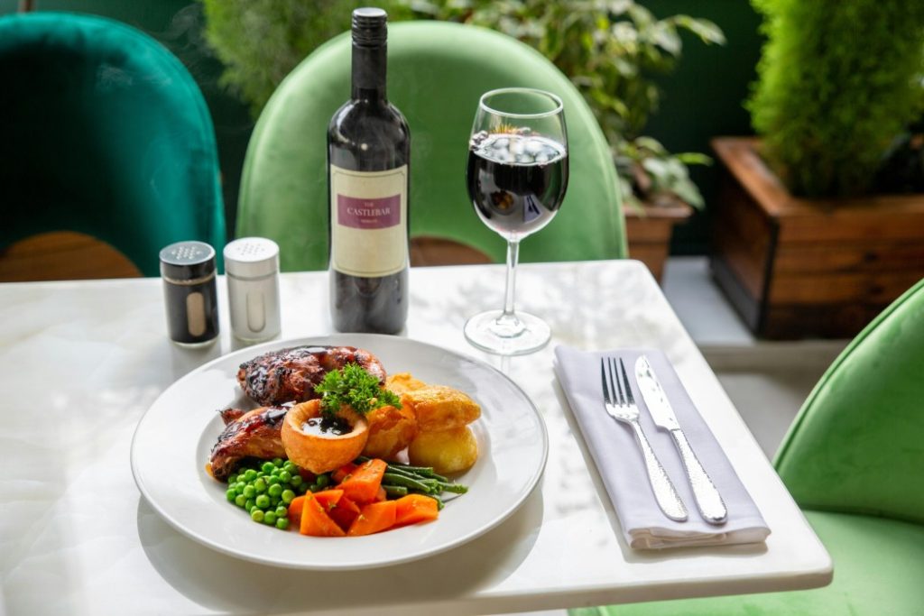 Best Sunday Roasts in Yorkshire - Roast dinner with red wine